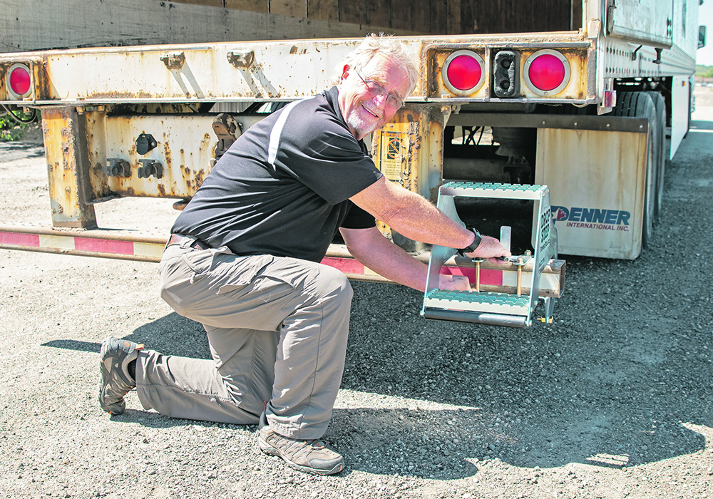 The step folds out of the way, on it’s own if it comes into contact with a dock. The steps provide safe access to decks or vans, says Brian Olson of PowerPin.  | PowerPin photo