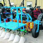 Researchers mounted Garford spray shields and a spraying system with Teejet Even nozzles on a steerable cultivator frame to research inter-row spraying. | Eric Johnson photo