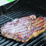 Sirloin steak sizzles on the barbecue. | Joan Airey photo