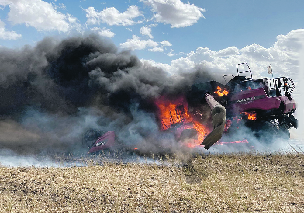 This combine is a total loss after a fire on the LeBlanc farm near Estevan, Sask., Sept. 2. Gracie LeBlanc, 13, was harvesting canola at the time and safely exited the cab before it was engulfed in flames. |  Jason LeBlanc photo