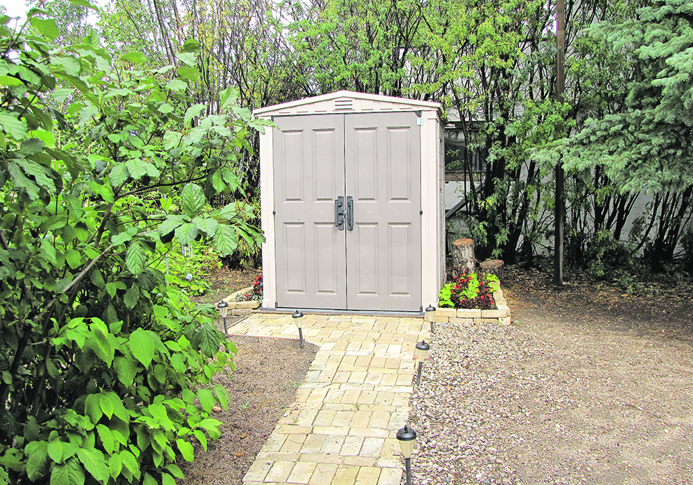 A recycled brick path to a garden shed and brick flower beds were long awaited projects that were completed during time spent at home social distancing because of COVID-19.  |  Betty Ann Deobald photo