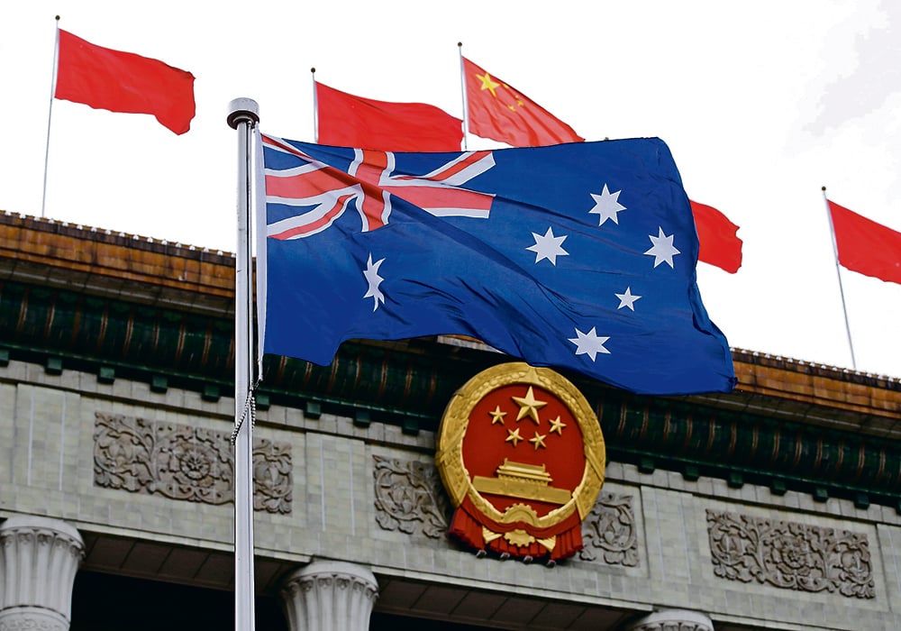 Australia’s recent troubles with China appeared to begin with a call for an investigation into the COVID-19 pandemic’s origins, but those inside the Australian government says worries have been building for some time over what’s perceived to be China’s threat to Australia’s democracy and national sovereignty.  | Reuters/Jason Lee photo