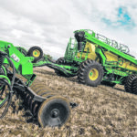 The new mid-sized carat is available as a tow-behind or a tow-between. Bigger carts like the C850 are typically only tow-betweeners. | John Deere photo