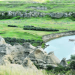Milk River flow in July, shown here, was reduced later in summer. Local irrigators were cut off and water restrictions were implemented in area towns and villages. | File photo