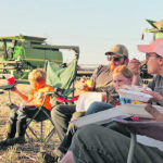 Three generations gather together to have supper in the field: Colleen Fink, left, Jaxon, Bryce, Alexis and Nicole Siwy and Lloyd Fink. | Christalee Froese photo