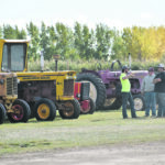 The tracor pull event at the Coyote Flats Pioneer Village near Picture Butte, Alta., proves a good place for tractor renovators to compare notes. | Barb Glen photo