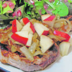 Pan-seared pork chops topped with juicy red pears and caramelized onions create a colourful and flavourful dinner. | Betty Ann Deobald photo