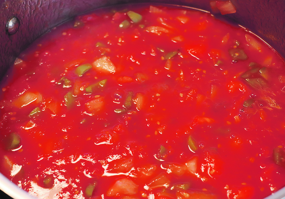 TJ’s salsa simmers on the stove.  |  Joan Airey photo