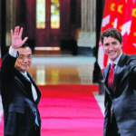 Prime Minister Justin Trudeau and Chinese Premier Li Keqiang wave during happier times between the two countries. The best approach to take now with China might be to not kowtow to the Asian powerhouse but also endeavour to allow the situation to cool and avoid provoking the dragon. | Reuters/Chris Wattie photo