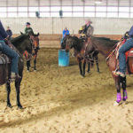Cain Quam speaks to riders at one of his horsemanship clinics. | Christalee Froese photo