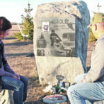 Raelene and Russell Herold take a moment at the grave of their 16-year-old son, Adam Herold, who died April 6, 2018, in the Humboldt Broncos bus crash. | Christalee Froese photo