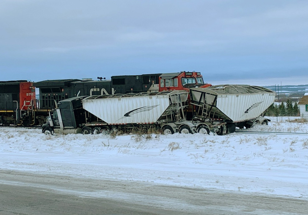 Rocky Omelchenko had just dropped off a load of "so-so" wheat and was about to cross the highway when the accident occurred. | WP freelancer photo