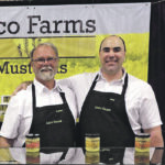 Robert, left, and Ben Luco sell their mustard at locations across southern Alberta, including the farmers market in Lethbridge. | Supplied photo