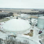 Nearing the end of construction, the West Central Ag Agridome in Beltrami Minnesota is 350 feet in diameter, 80 feet high and holds 2.6 million bushels. It cost $5.5 million in addition to existing infrastructure. | Geometrica photo