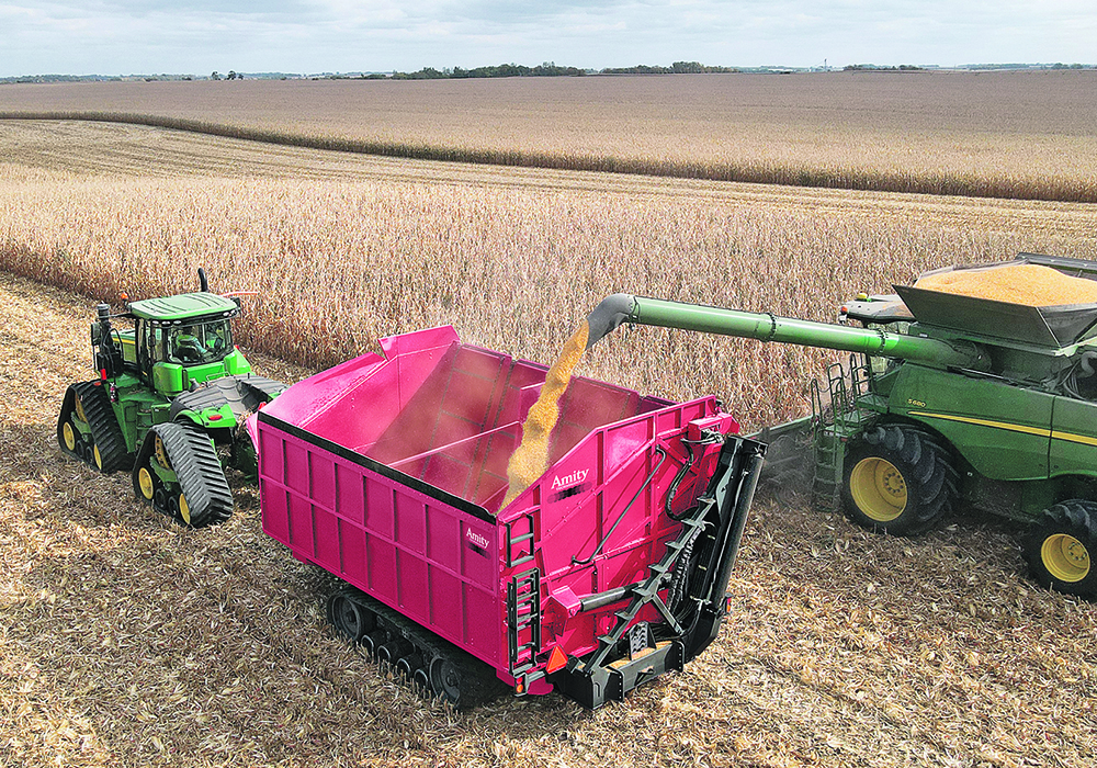 The Amity Technology Crop Chaser is a grain and silage cart designed for soft soils and/or low compaction.  Rather than auger it into the truck, dump it. | Amity Technology photo