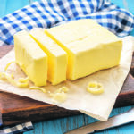Butter demand took a hit in the 1980s and 1990s due to the massive growth of margarine and the association of dairy products with health conditions. However, those health concerns have been reduced recently by fresher research, and butter has become less expensive. | Getty Images