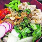 Sesame sauce and peanuts add a rich, nutty flavour to a noodle bowl of fresh chopped vegetables and chicken. The sesame sauce can also be used to marinate the chicken before stir-frying. | Betty Ann Deobald photo