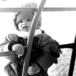 The author, seen here, liked to go out to play but hated getting dressed for the occasion. | Alma Barkman photo