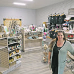 Angie McLean stands in the newly opened back section of her Farmstead Market and More store in Kitscoty, Alta. McLean sells products for vendors, many from the local area. She has more than 100 emails in her inbox from vendors wanting to sell their products in her store. | Mary MacArthur photo