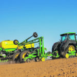 Deere has a new integrated tractor and planter unit, pairing 1,000 gallons of on-board liquid with 600 installed on the planter. A new 130 bushel seed tank can mean up to 80 acres between filling, applying 20 gallons of fertilizer. | John Deere photo