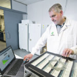 Andy Sharpe works with a PromethION high throughput DNA and RNA sequencing device at the Global Institute for Food Security in Saskatoon. | Dave Stobbe photo