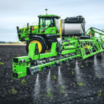 With 36 cameras and up to a 120 foot steel boom, the new See and Spray option on Deere's latest sprayers can reduce burn-off spray use by more than 75 percent. The machines are limited to 12 miles per hour for application accuracy. From the time a camera sees a weed it is 200 milliseconds until spray is applied to it. | John Deere photo