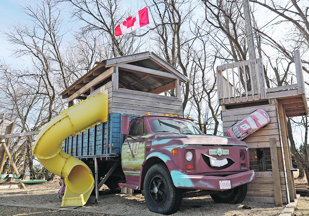Barb and Dennis McAuley’s family have turned an old grain truck found at an estate sale a few years ago into playground equipment near Wetaskiwin, Alta. The couple started the McAuley Truck Box company in 1974, the year they were married. Dennis thinks this truck box was the sixth one the family made. A ladder up a hole cut through the truck box allows their grandchildren to climb into the box fort and down the slide. Also attached to the play truck are swings, a climbing wall and zip line.  |  Mary MacArthur photo