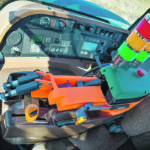 Two actuators that can pull two different hydraulic levers and PTO mechanism that turns it on and off and a throttle control make up the remote system. | Vincent Pawluski photo
