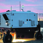The 9,000 pound, autonomous field tool uses a 72-horsepower Cummins diesel engine and lasers that operate outside of the visible range at a 10.6-micron wavelength, rapidly making intense heat that, when focused on weeds, kills them. | Carbon Robotics photo