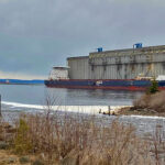 Strong global demand for Canadian grains and oilseed continues to draw down stocks of all major crops. Here, the freighter G3 Marquis takes on a load of grain at Richardson's Current River elevator at Thunder Bay. | Photo courtesy of the Port of Thunder Bay