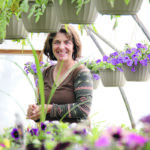 Sandra Lipsett stands in one of her greenhouses. | Christalee Froese photo