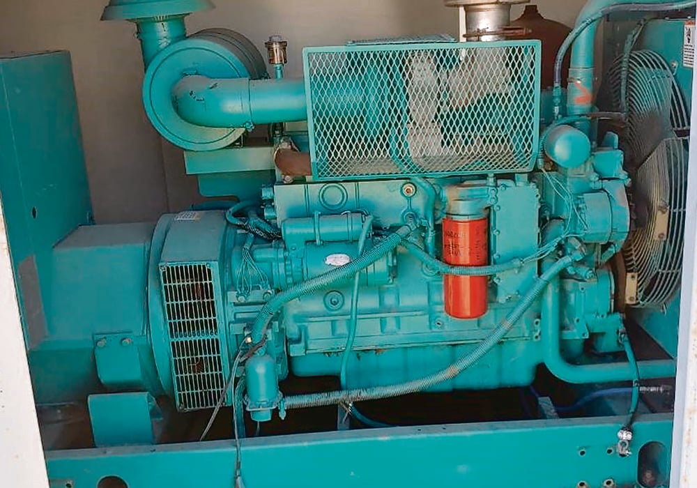 Bringing three-phase into the bin yard can cost $250,000 to $1 million. For an investment of $25,000 to $35,000, a farmer can buy a used three-phase 150KW genset like this from the Alberta oil patch. | Wall Grain photo