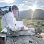 Beekeeper Janelle Dunn prepares the evening’s hive deliveries during pollination time in the Okanagan Valley. Hives are moved in the morning and evening when they are not flying. | Submitted photo