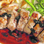 Pork tenderloin is one of the leanest cuts and is equivalent in fat to skinless chicken breasts. Pork pairs well with berries such as these haskaps. | Sarah Galvin photo