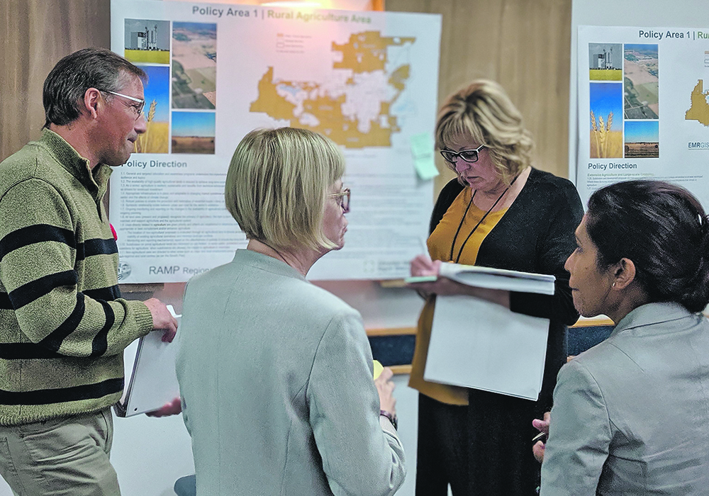 Parkland County mayor Rod Shaigec, who chairs the RAMP Task Force, talks with task force members about a plan to preserve farmland in the Edmonton area. | Photo courtesy the RAMP Task Force/Edmonton Metropolitan Region Board
