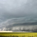 The hail storm that hit southern Alberta July 5 passed by Glenwood, Alta., about 8:15 p.m. menacing crops and leaving the town of Cardston beaten and dented. | Steve Connelly photo