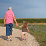 What could be more loving for a granddaughter than a snuggle with Grandma who is perfectly relaxed, loving and caring? | Getty Images