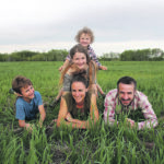 Eli, Amy, Alexis, Mowat and Donald Nikkel on their organic farm near Lundar, Man. | Supplied photo