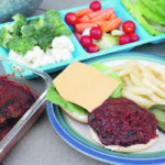 Place cooked burgers in a flavourful barbecue sauce to keep them hot, juicy and ready to serve to hungry swimmers or fishermen at the cabin. | Betty Ann Deobald photo