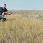 Timm Döbert uses GPS on a grassland field exploration expedition while conducting research in rotational adaptive grazing management. | Timm Döbert photo
