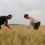 Officials are working on what the disaster assistance program will cover and the accompanying compensation levels. The cost-share is 60 percent federal and 40 percent provincial. Here, federal ag minister Marie-Claude Bibeau visits Curtis McRae’s farm north of Winnipeg on a tour of drought-struck regions. | Ed White photo