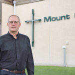 It took former hog farmer Colin Millang 27 years, but he eventually received his master’s of divinity and became a full-time Lutheran pastor. His latest parish is Mount Olivet in Sherwood Park, Alta. | Mary Macarthur photo