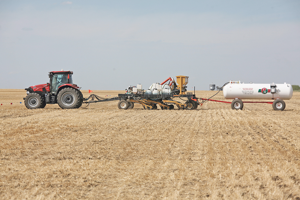 Using a Swiss Army Knife of plot seeders based on a SeedMaster drill platform, Dennis Bulani plants comparative plots across a large swath of Saskatchewan, including this one near Unity, Sask.  |  Mike Raine photos