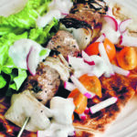 Lamb and onion kebabs make a fast and delicious barbecue lunch sandwich with naan. | Sarah Galvin photo