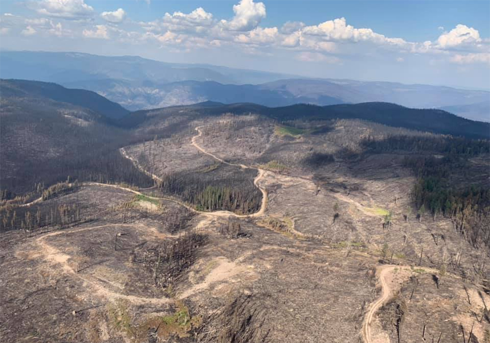 "It wasn’t even a wall of flame. It was a tornado of fire coming around the edge of the mountain towards us." - Rhonda MacDonald, rancher | Screencap via Facebook/Rhonda MacDonald