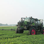 Rogators are now green, and have an optional chassis lift that provides up to 76 inches of clearance between the ground and the bottom of the frame. | Agco/Paul D'Andrea photo