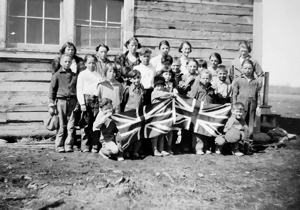 Louise McLean stands at back, far right, with her class at North Beaver River School in 1936. | Family photo
