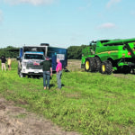 Fifty Ontario farmers showed up at Haggerty Creek Ag Services last week for a demonstration of the new Raven OmniDrive autonomous tractor. Raven dealer Chuck Baresich said it was “plenty weird” to drive his combine and have a driverless tractor pull-up alongside. | Haggerty Creek Ag Services photo