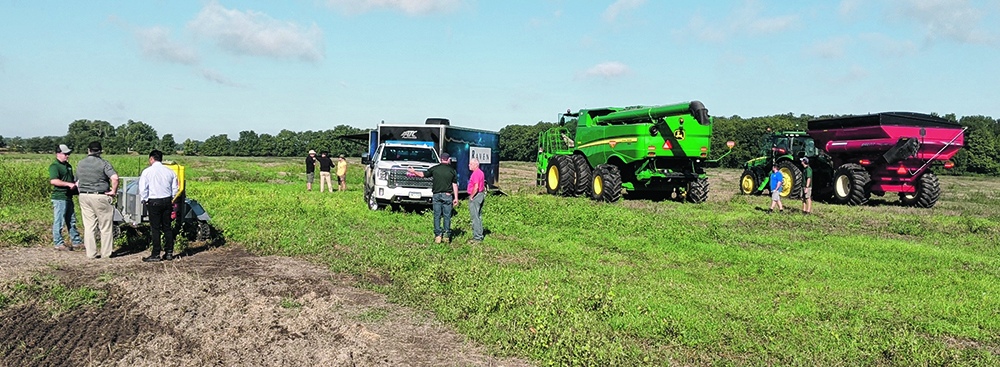 Fifty Ontario farmers showed up at Haggerty Creek Ag Services last week for a demonstration of the new Raven OmniDrive autonomous tractor. Raven dealer Chuck Baresich said it was “plenty weird” to drive his combine and have a driverless tractor pull-up alongside. | Haggerty Creek Ag Services photo