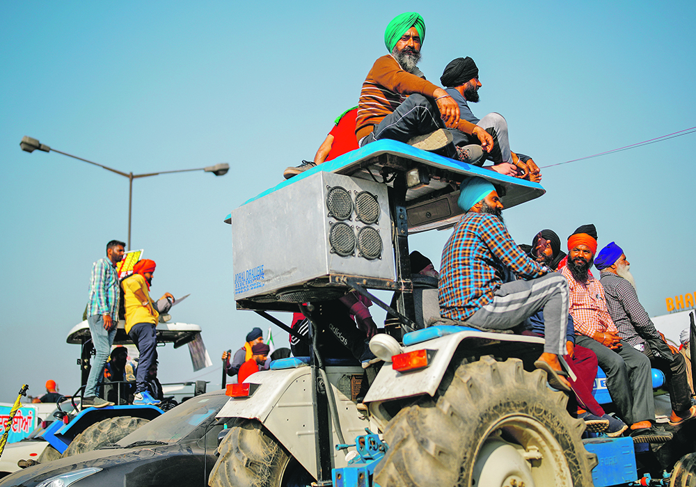 For 10 months, tens of thousands of farmers have camped out on major highways around the capital, New Delhi, to oppose the laws in the longest-running growers' protest against Prime Minister Narendra Modi's government. | Reuters/Adnan Abidi photo